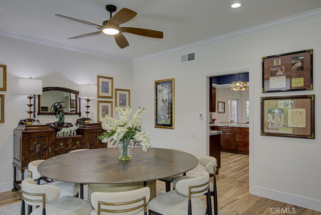 Another view of the dining room. Entry to the kitchen through the door at right. - 5553 Rayo Del Sol B, Laguna Woods CA 92637 - photo 16