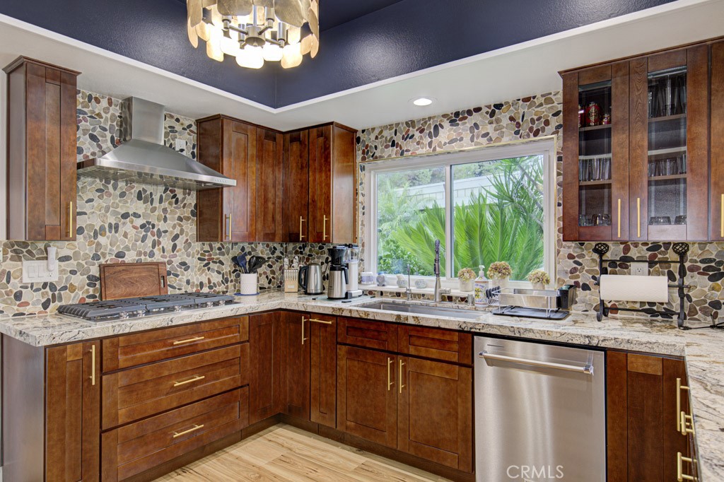 Another view of the remodeled kitchen. Upgrades include stainless steel KitchenAid appliances (including a gas cooktop), - 5553 Rayo Del Sol B, Laguna Woods CA 92637 - photo 18