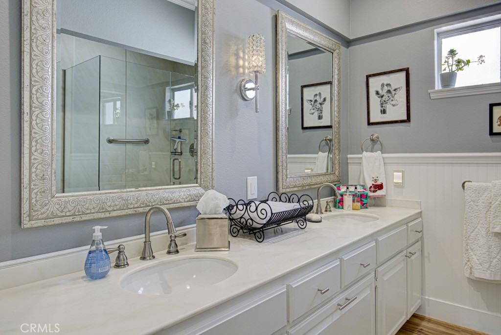 Guest bathroom has dual sinks. - 5553 Rayo Del Sol B, Laguna Woods CA 92637 - photo 38