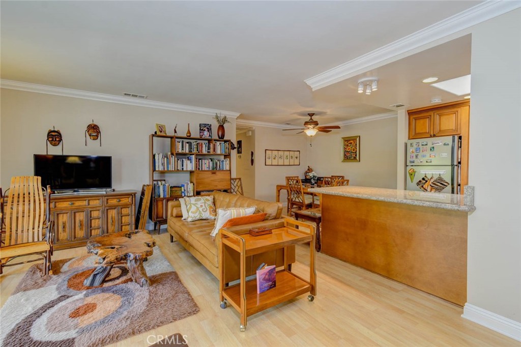 LIVING ROOM, KITCHEN & DINING AREA - 633 Avenida Sevilla O, Laguna Woods CA 92637 - photo 3