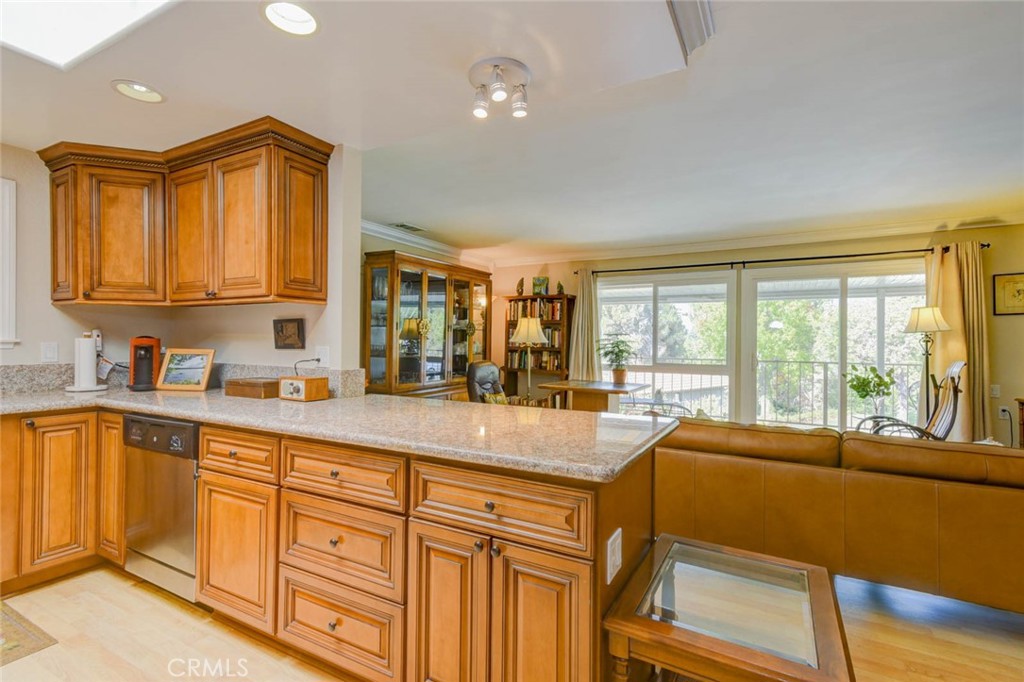 KITCHEN COUNTER/BREAKFAST BAR - 633 Avenida Sevilla O, Laguna Woods CA 92637 - photo 15