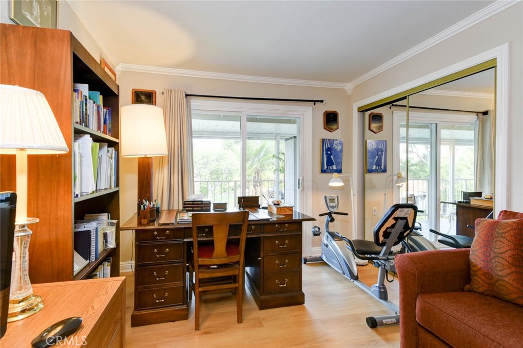MIRRORED-DOOR CLOSETS IN THE GUEST BEDROOM/OFFICE - 633 Avenida Sevilla O, Laguna Woods CA 92637 - photo 23