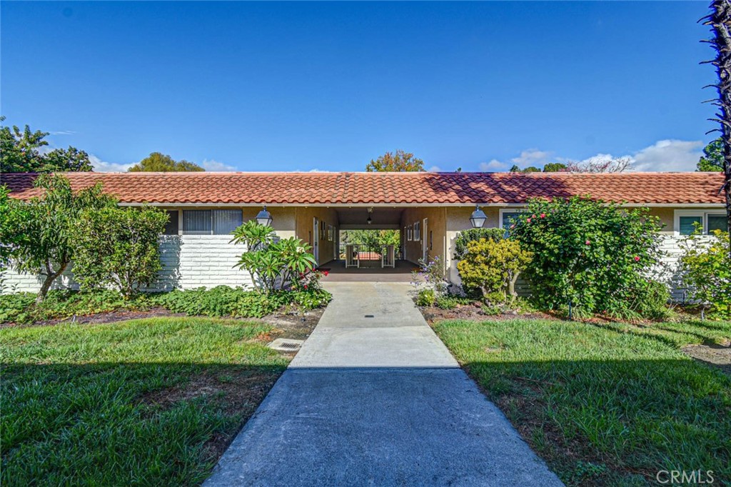 SIDEWALK FROM CARPORT TO ENTRANCE - 633 Avenida Sevilla O, Laguna Woods CA 92637 - photo 57
