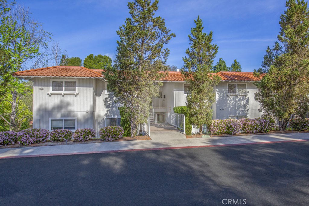 Welcome to 658-O Avenida Sevilla - a two-bedroom, two-bath, upper-level CASTILLA floorplan with just over 1000 sq. ft. o - 658 Avenida Sevilla O, Laguna Woods CA 92637 - photo 1