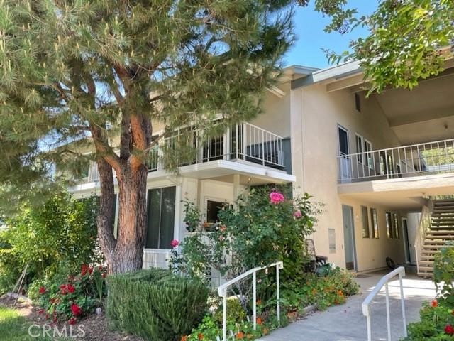 Front of Home. 16 Steps to 2nd Floor. - 8 Via Castilla N, Laguna Woods CA 92637 - photo 1