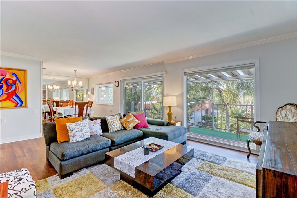 BRIGHT LIVING ROOM WITH LARGE WINDOWS - 881 Via Mendoza O, Laguna Woods CA 92637 - photo 10