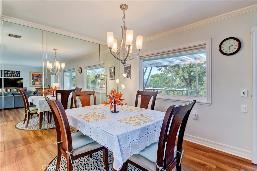 DINING ARE WITH SHADED WINDOW - 881 Via Mendoza O, Laguna Woods CA 92637 - photo 13