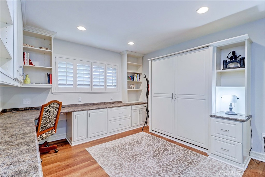 SECOND BEDROOM WITH WRAP-AROUND DESK AND MURPHY BED - 881 Via Mendoza O, Laguna Woods CA 92637 - photo 21
