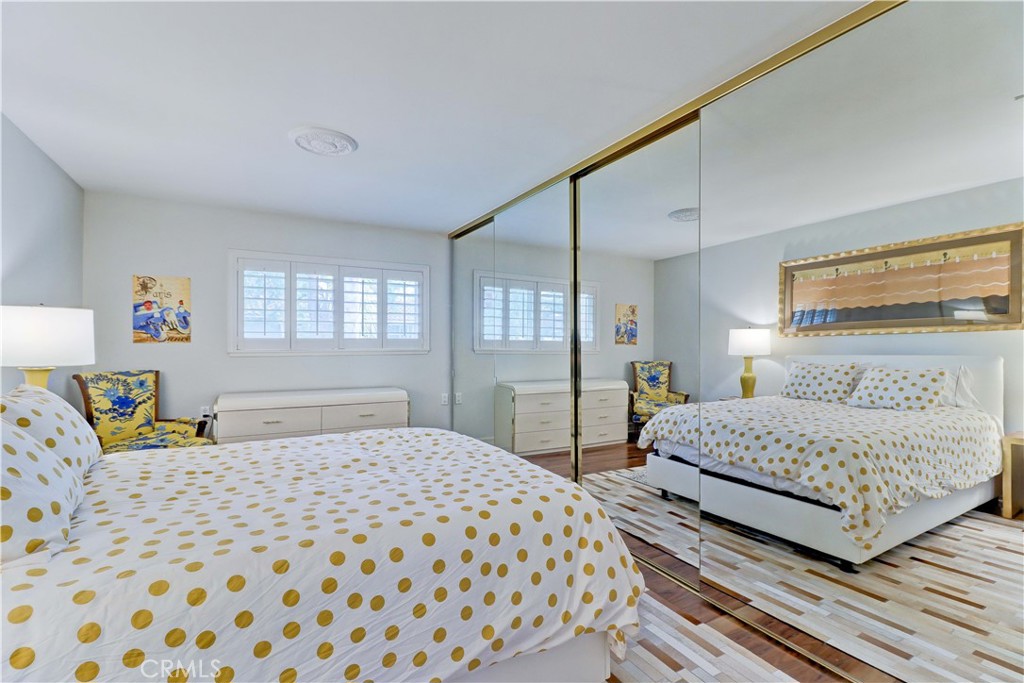 PRIMARY BEDROOM MIRRORED CLOSET DOORS - 881 Via Mendoza O, Laguna Woods CA 92637 - photo 29