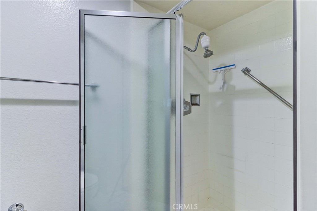 PRIMARY BATHROOM WALK-IN SHOWER - 881 Via Mendoza O, Laguna Woods CA 92637 - photo 33