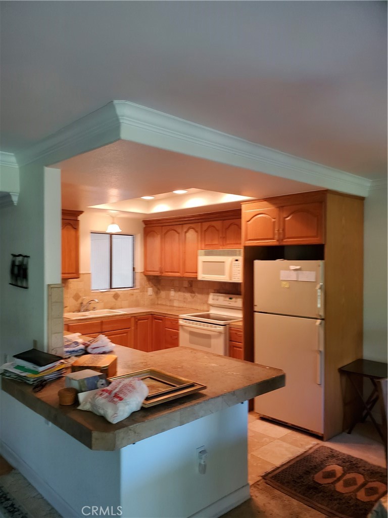 Updated Kitchen and counters - 890 Ronda Sevilla O, Laguna Woods CA 92637 - photo 1