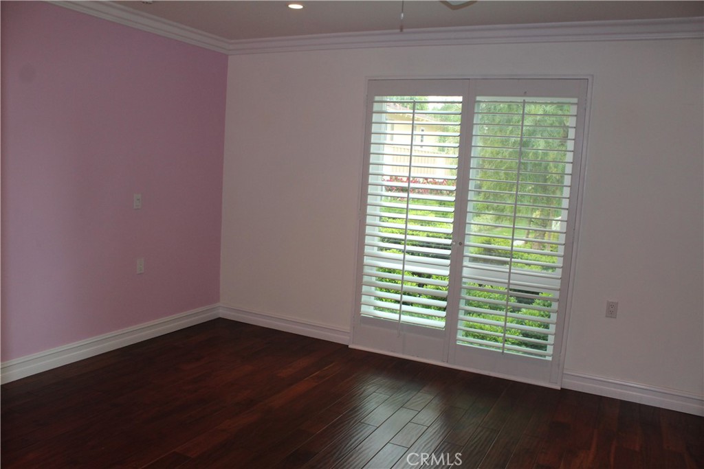 Principal bedroom has lovely green view - 963 Calle Aragon C, Laguna Woods CA 92637 - photo 10