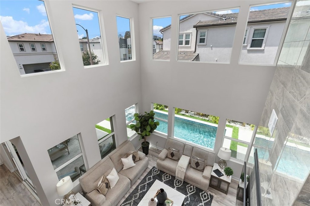 Enjoy picturesque blue skies and beautiful sunsets through the home's expansive windows. - 111 Edna Parkway, Lake Forest CA 92630 - photo 21