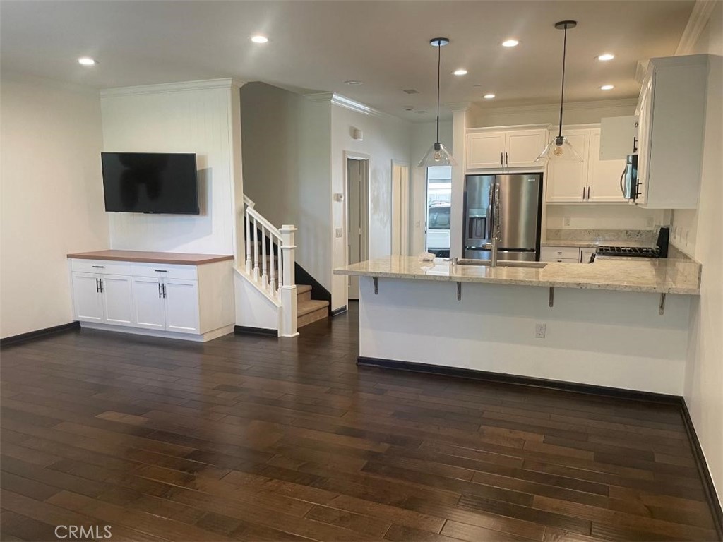 Upgraded Beautiful 3 bedroom , 2 1/2 bath townhouse , with direct access to two spacious garage - 1412 El Paseo, Lake Forest CA 92610 - photo 1