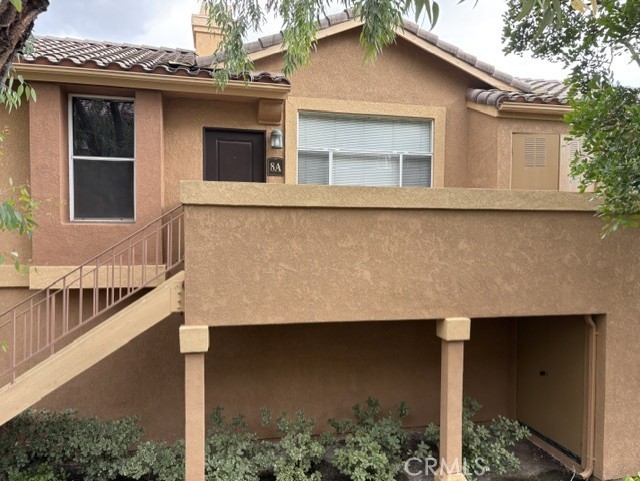 Exterior Front of Condo - 19431 Rue De Valore 8A, Lake Forest CA 92610 - photo 1