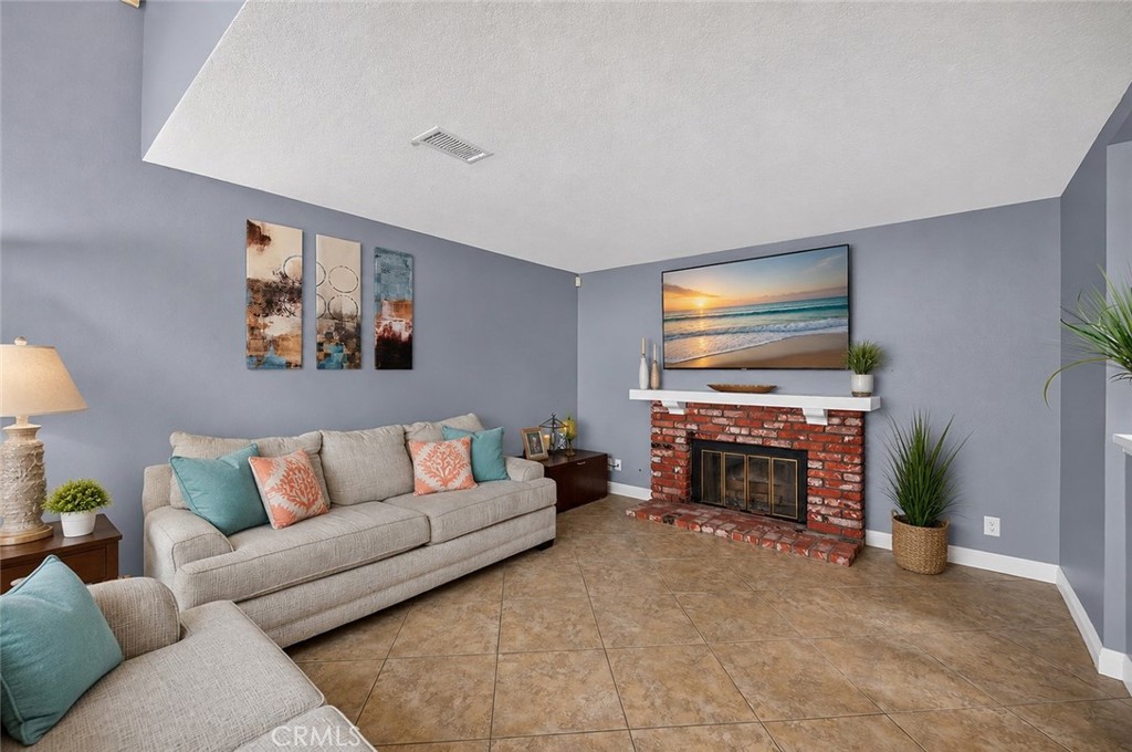 Living room with Fireplace - 21056 Champlain, Lake Forest CA 92630 - photo 8