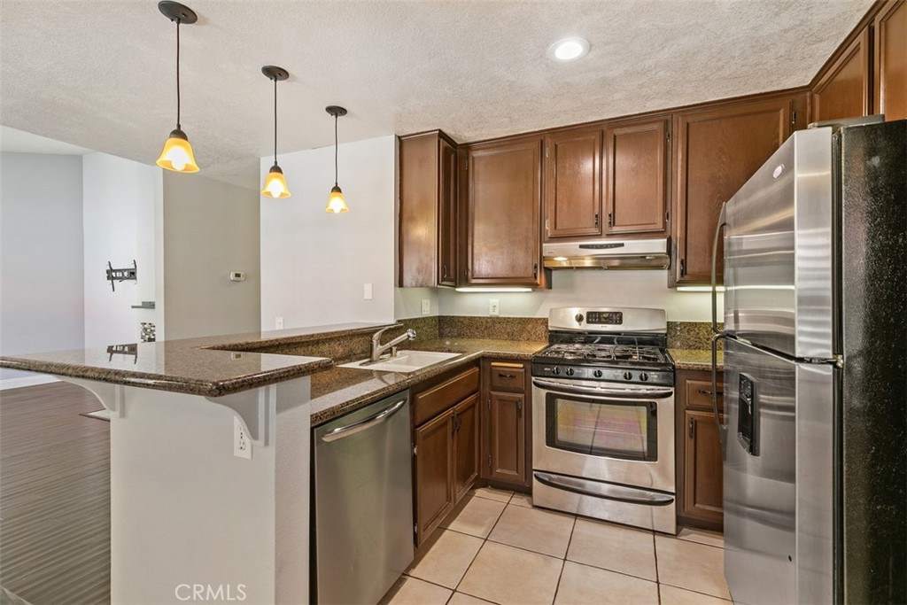 Remodeled kitchen. - 21227 Camelia 18, Lake Forest CA 92630 - photo 8
