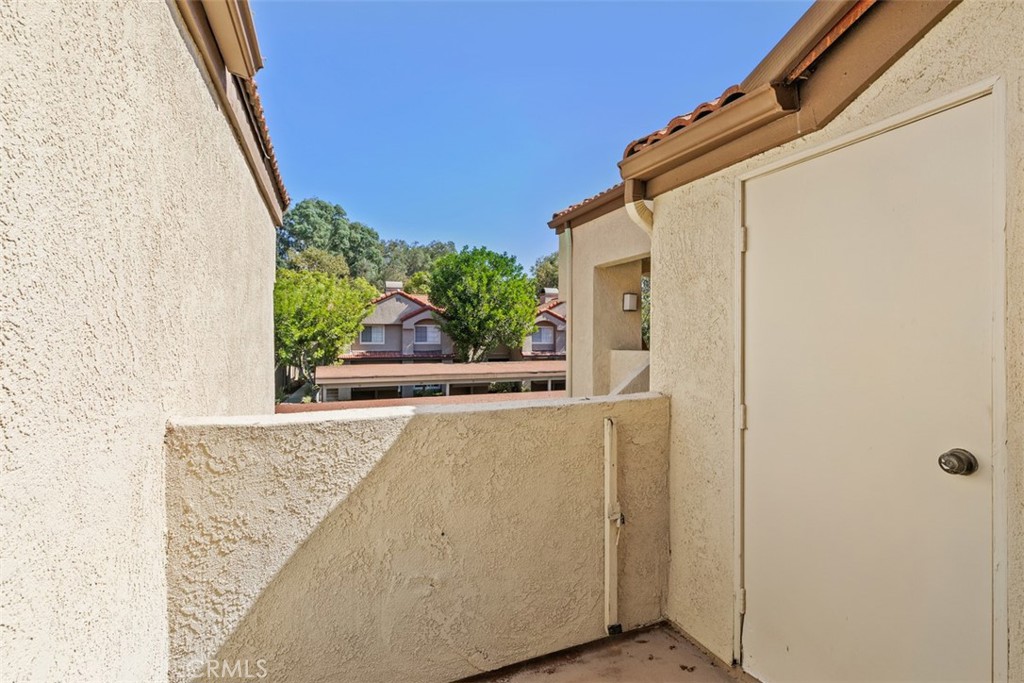 Balcony area with storage closet. - 21227 Camelia 18, Lake Forest CA 92630 - photo 15