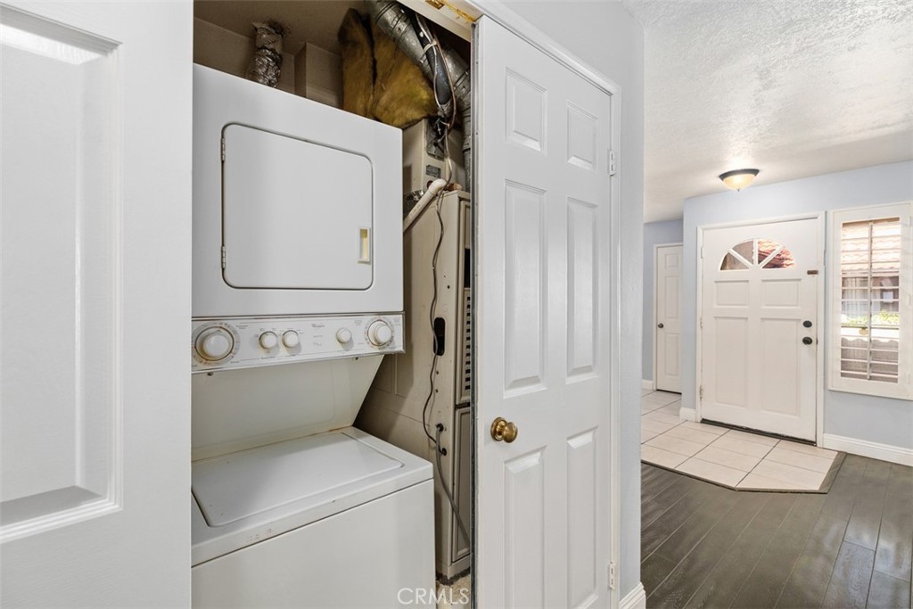 Washer & dryer area in hallway. - 21227 Camelia 18, Lake Forest CA 92630 - photo 17