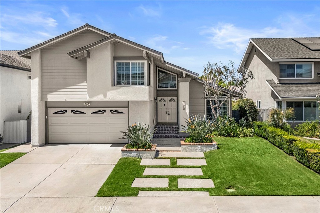 GREAT CURB APPEAL WITH NEWER GARAGE ROLL UP DOOR AND METAL ROOF - 21551 Sitio Verano, Lake Forest CA 92630 - photo 1