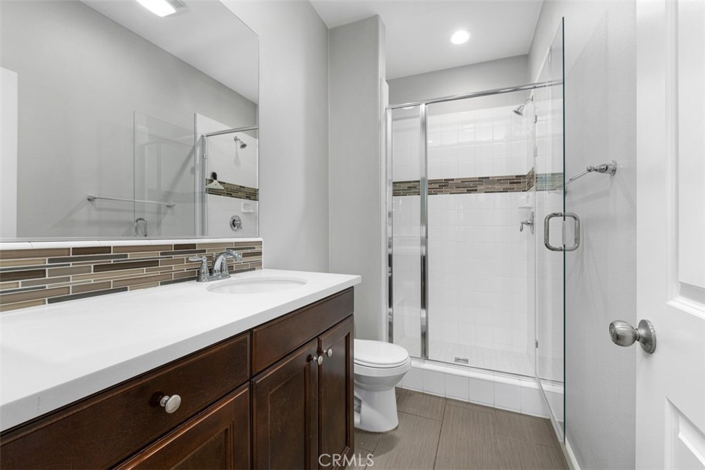 Downstairs bathroom with easy access shower is great for guests. - 219 Primrose Drive, Lake Forest CA 92610 - photo 14