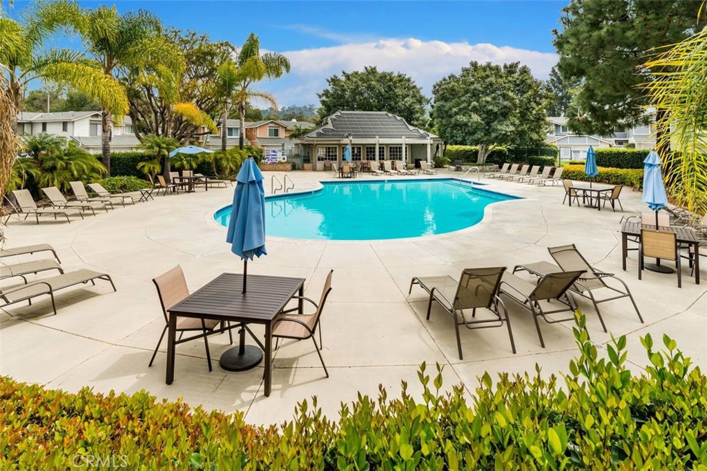 Sparkling pool No. 1 with Clubhouse right outside your front door - 22006 Summit Hill Drive, Lake Forest CA 92630 - photo 1