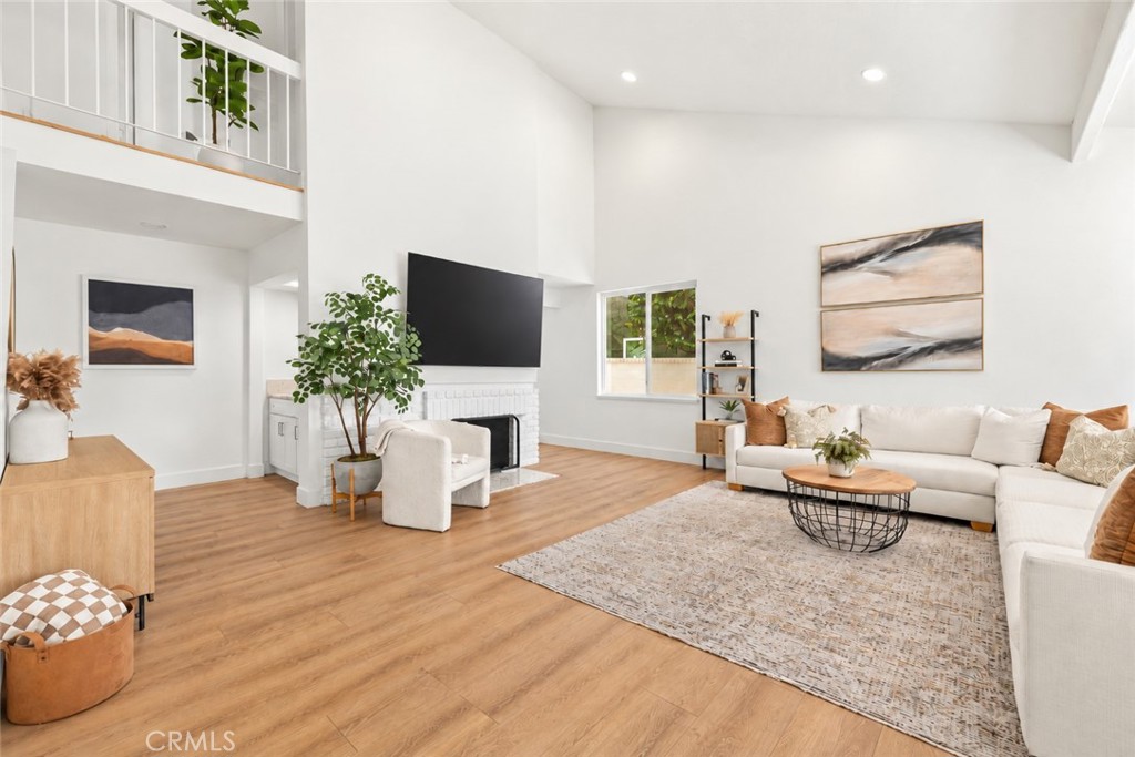 Living Room with Fireplace - 22145 Pheasant Street, Lake Forest CA 92630 - photo 8