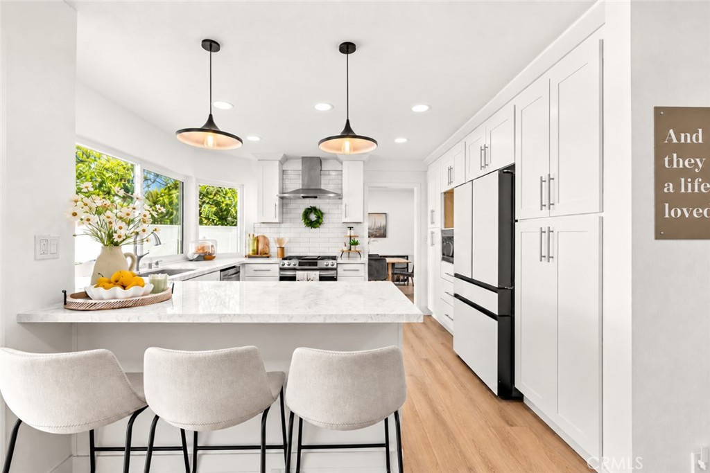 Kitchen Peninsula with Seating - 22145 Pheasant Street, Lake Forest CA 92630 - photo 18