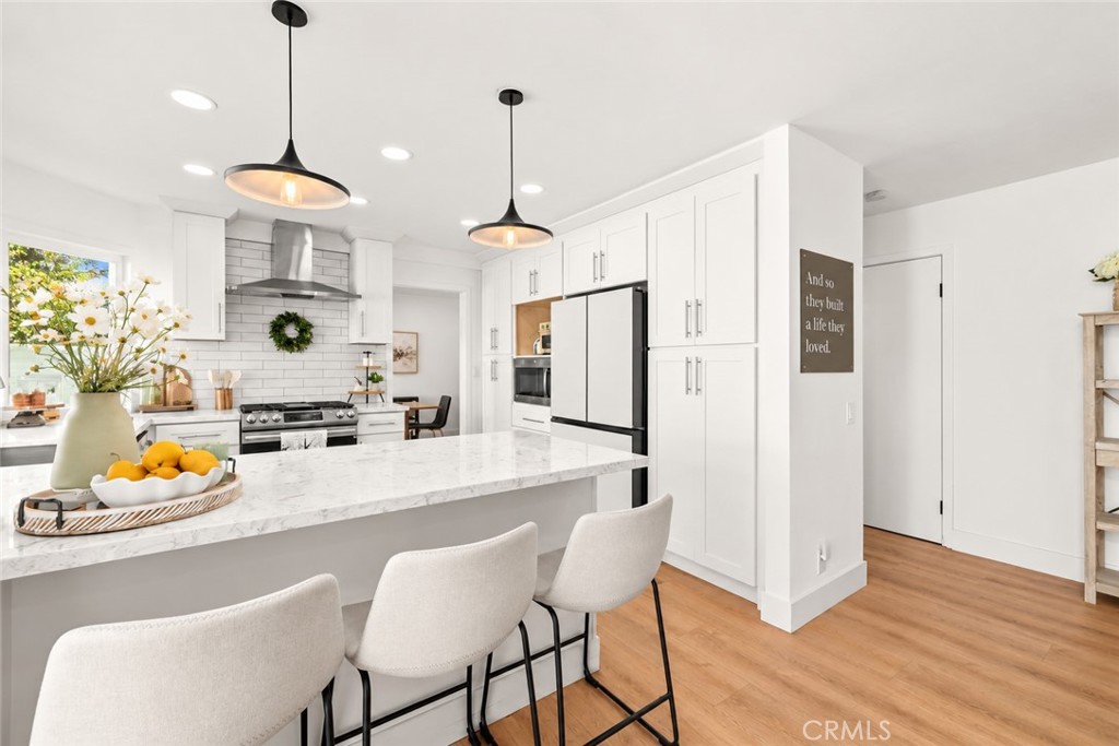 Kitchen Peninsula with Seating - 22145 Pheasant Street, Lake Forest CA 92630 - photo 19