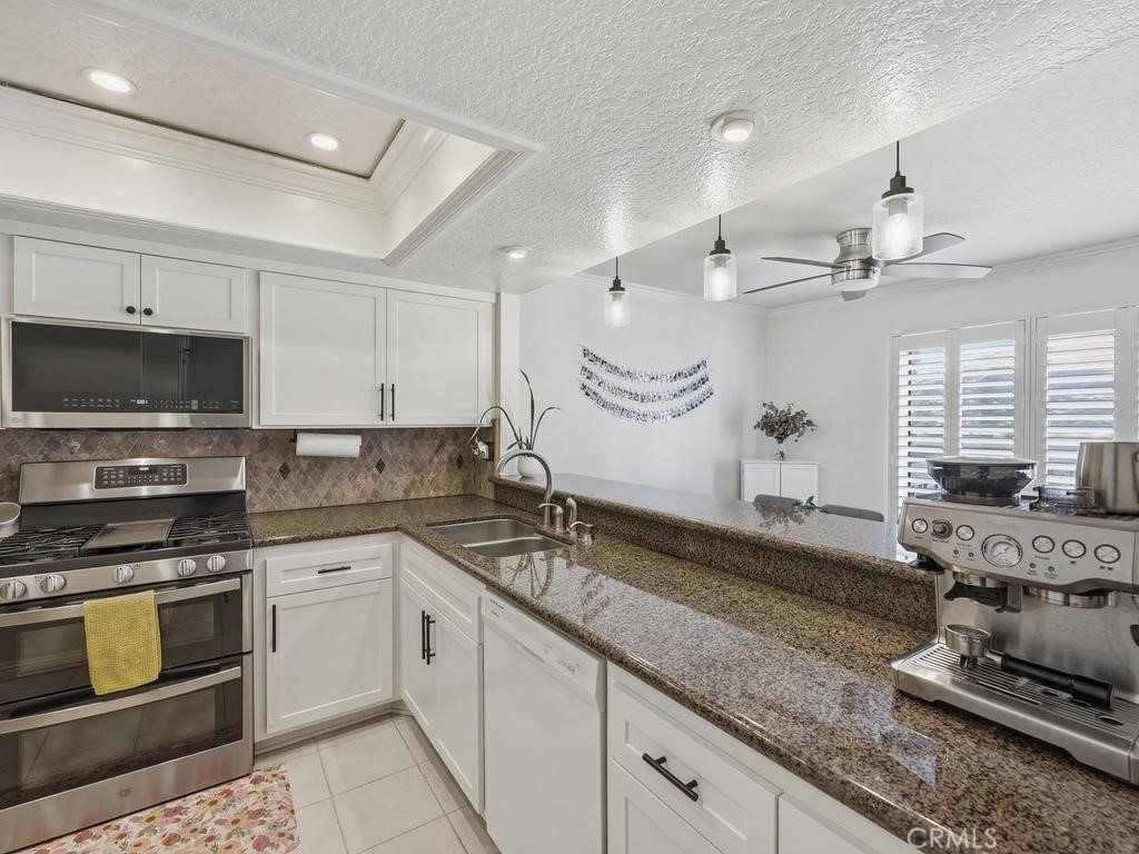 Updated Kitchen with softclose cabinets and drawers. - 22185 Cedar Pointe, Lake Forest CA 92630 - photo 17