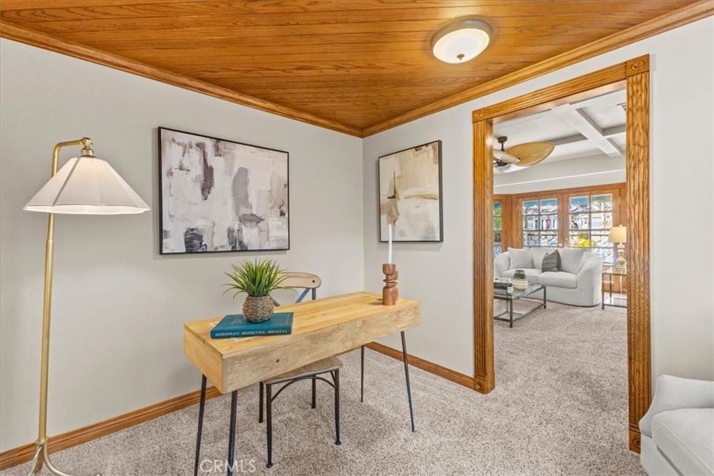 The bonus room off the living room is a great spot for a home office, study, or quiet place to unwind. It has its own wo - 22212 Shady Rim, Lake Forest CA 92630 - photo 10