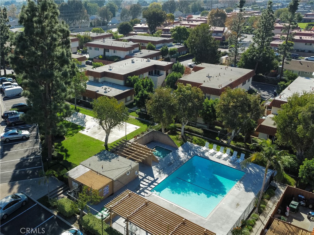community pool and parking area - 22722 Malaga, Lake Forest CA 92630 - photo 1
