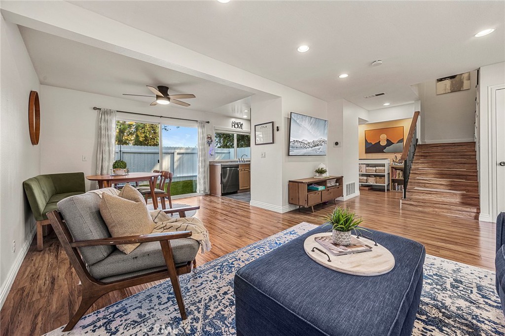 Living space open to kitchen, dining and backyard - 22946 Moonstone, Lake Forest CA 92630 - photo 7