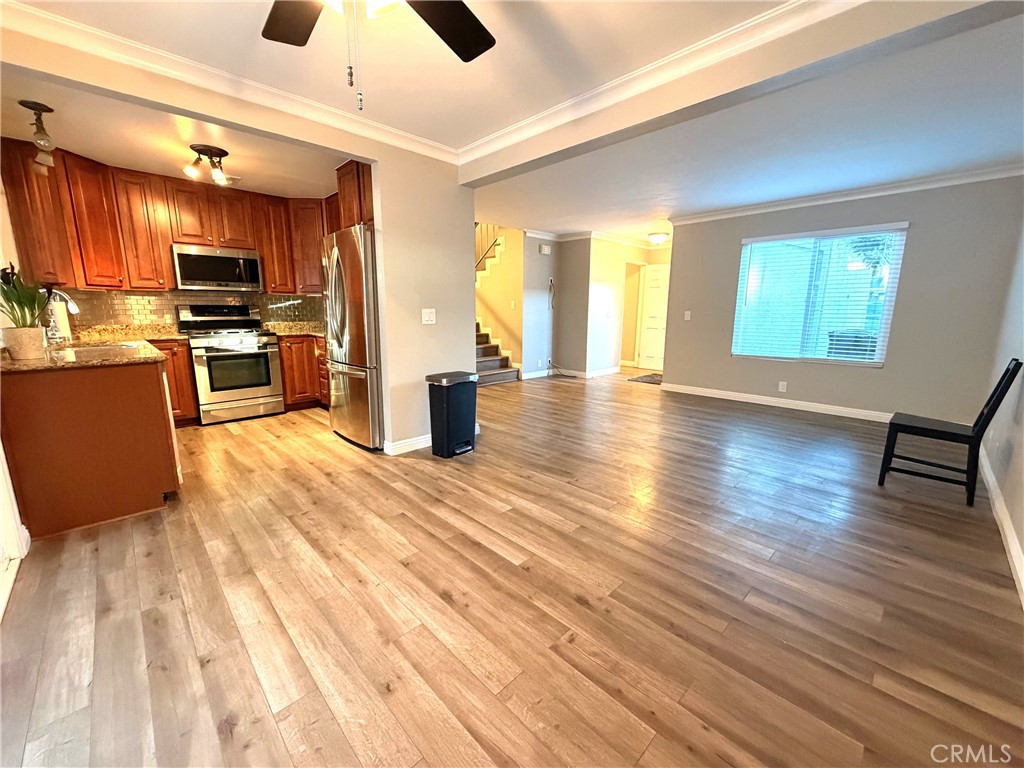 Upgraded flooring, kitchen, appliances, paint, and more - 22954 Moonstone, Lake Forest CA 92630 - photo 1