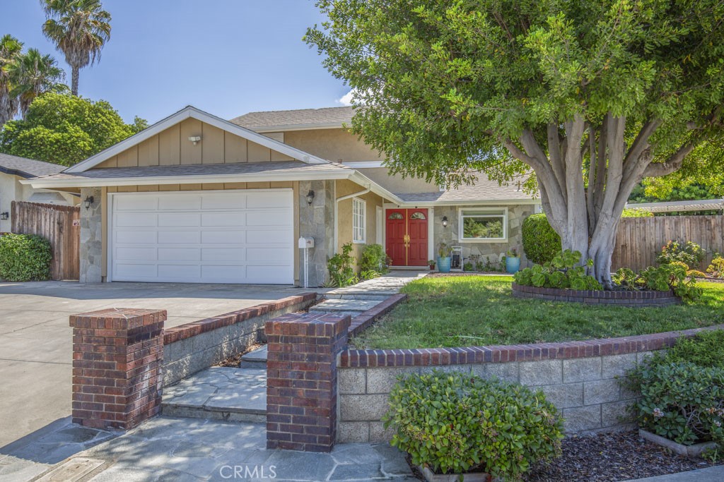 2 story house, 2 car garage, Drive way parking: fits two cars & Trailer/RV. - 23902 Barton Street, Lake Forest CA 92630 - photo 1