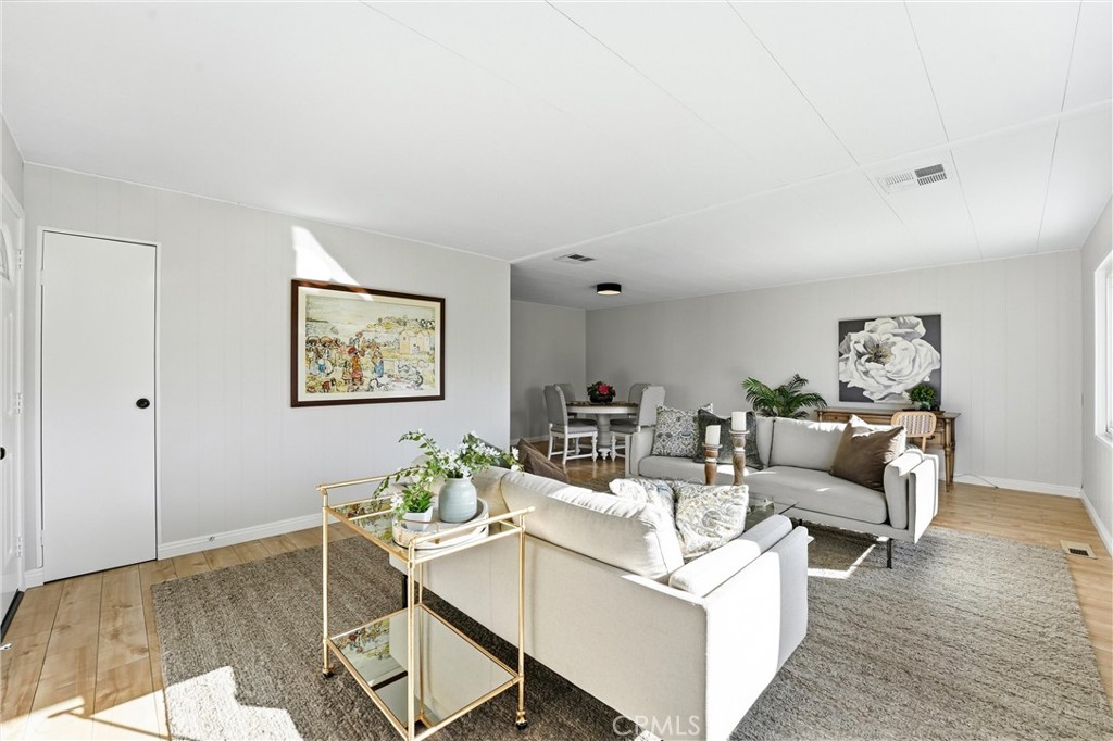 open concept to dining - 24001 Muirlands Boulevard 64, Lake Forest CA 92630 - photo 10