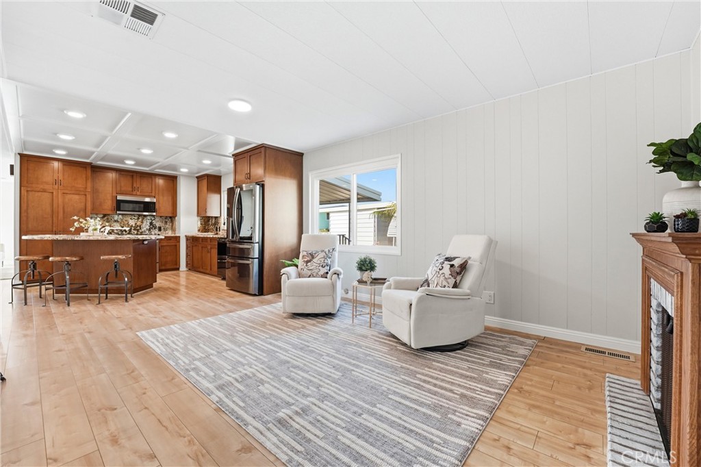 casual room - 24001 Muirlands Boulevard 64, Lake Forest CA 92630 - photo 11