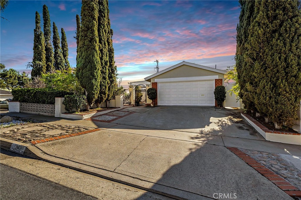 Twilight and lights were added to the picture. - 24192 Birdrock, Lake Forest CA 92630 - photo 1