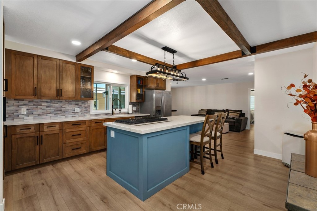 Open kitchen with large island - 24701 Raymond Way 135, Lake Forest CA 92630 - photo 13