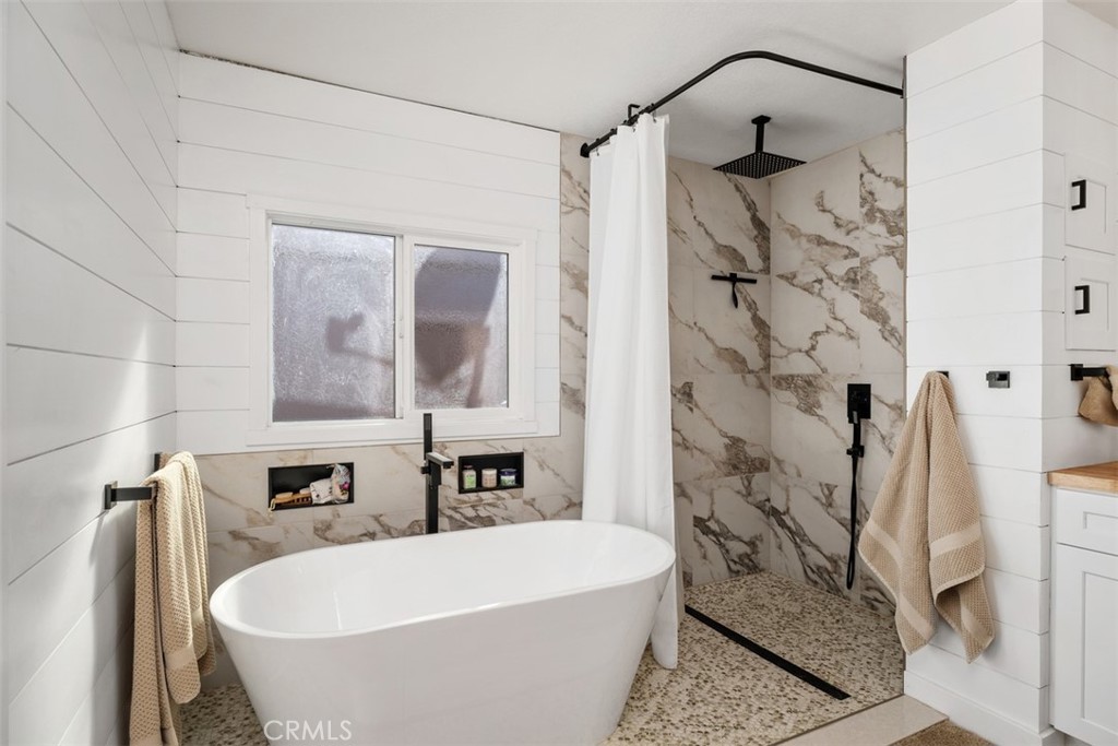 Master bathtub with walkin shower - 24701 Raymond Way 135, Lake Forest CA 92630 - photo 19