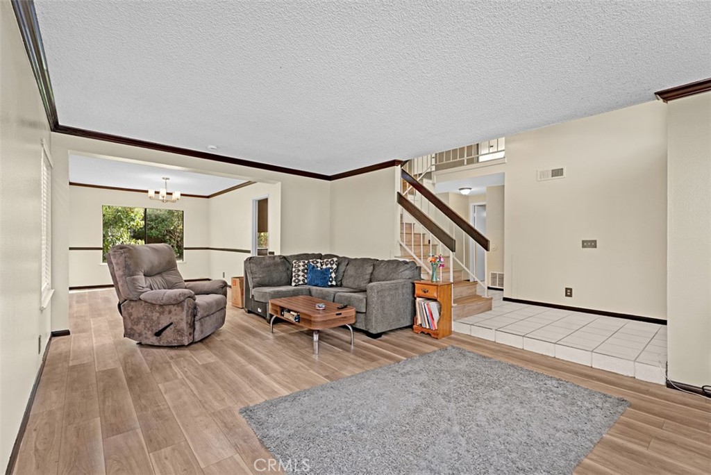 Open floor plan with spacious living room & dining room. - 24712 Via Del Rio, Lake Forest CA 92630 - photo 6
