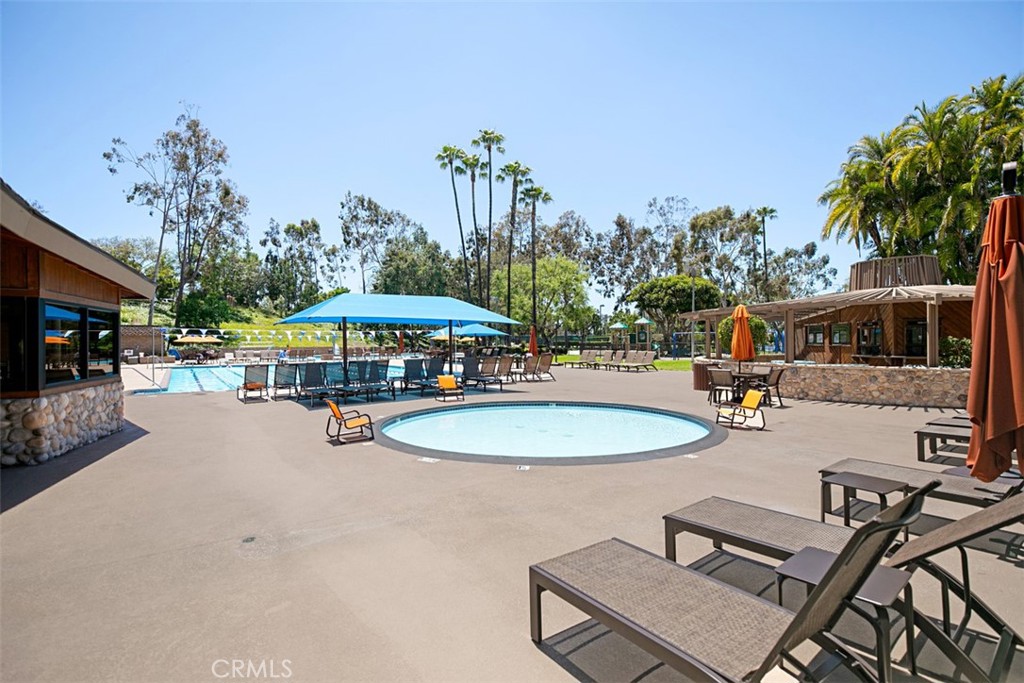 Children's pool & gym to the left & snack bar to the right. - 24712 Via Del Rio, Lake Forest CA 92630 - photo 28