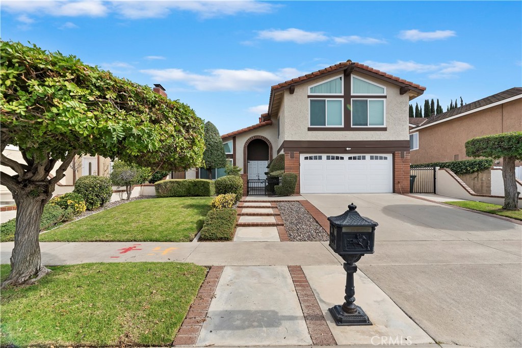Outstanding curb appeal with manicured landscaping and an inviting front entry in a desirable Lake Forest neighborhood - 25075 Owens Lake, Lake Forest CA 92630 - photo 1