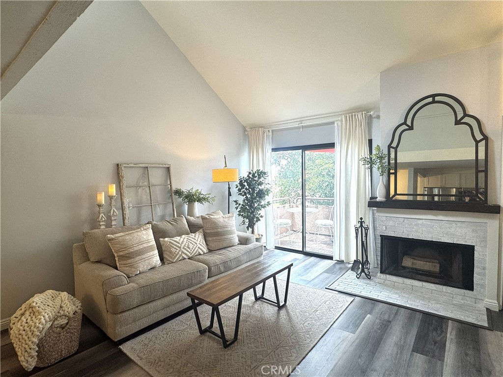 Living Room with Wood Burning Fireplace - 25761 Le Parc 58, Lake Forest CA 92630 - photo 1