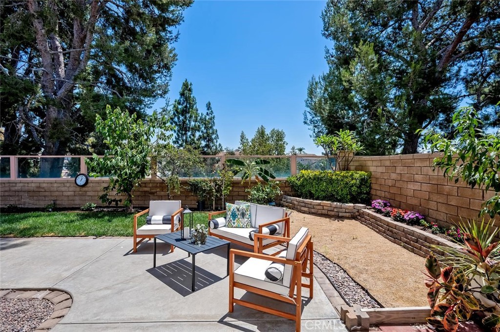 Privacy, mature trees, open sky, and plenty of usable outdoor space. - 26024 Donegal, Lake Forest CA 92630 - photo 1