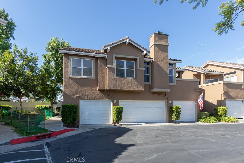 Second story, single level condo with garage and balcony. - 28456 Klondike, Lake Forest CA 92679 - photo 1