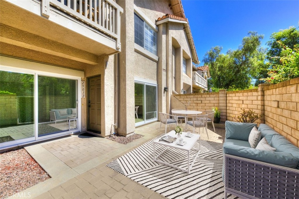 Huge private patio (virtually staged) - 29012 Canyon Ridge 120, Lake Forest CA 92679 - photo 2