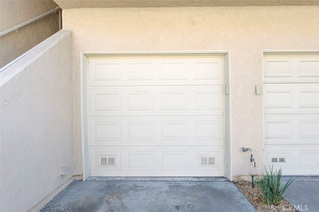 RARE find -- an attached garage with direct access into your new home. No lugging grocery bags up stairs! - 29012 Canyon Ridge 120, Lake Forest CA 92679 - photo 8