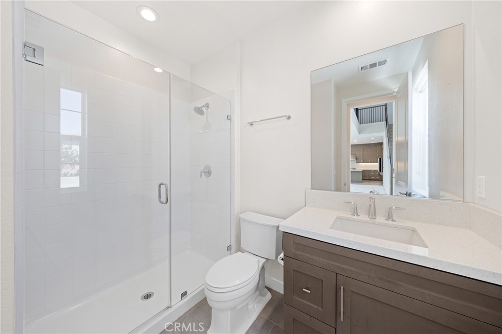 Downstair bedroom - 370 Brackens, Lake Forest CA 92630 - photo 13