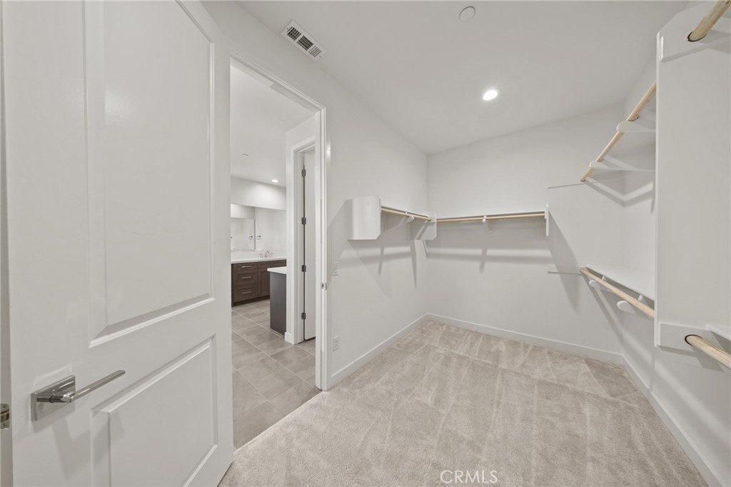 Primary closet - 370 Brackens, Lake Forest CA 92630 - photo 23
